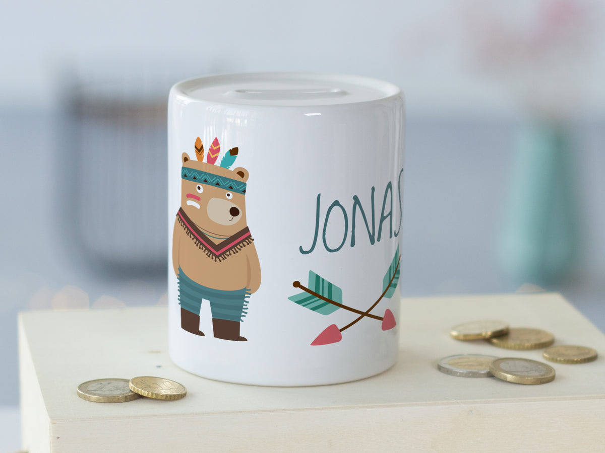 Weißes Sparschwein mit bärigem Design und Namen "JONAS".