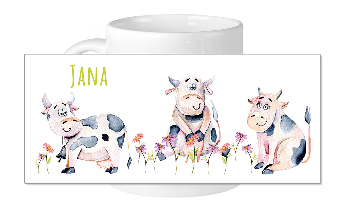 Kaffeetasse mit drei bunten Kühen und dem Namen "Jana".