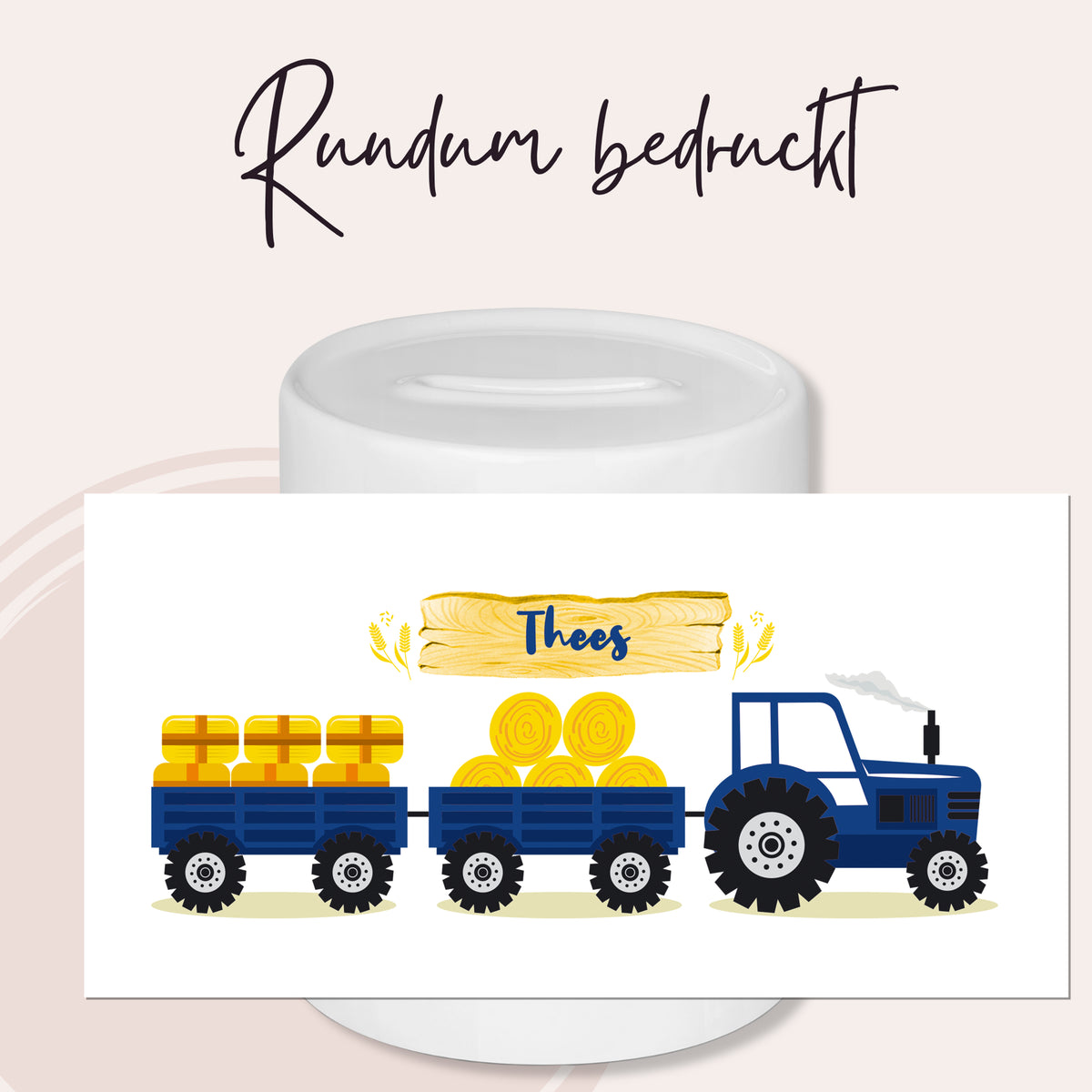 Blauer Traktor mit gelben Heuballen auf Anhänger.