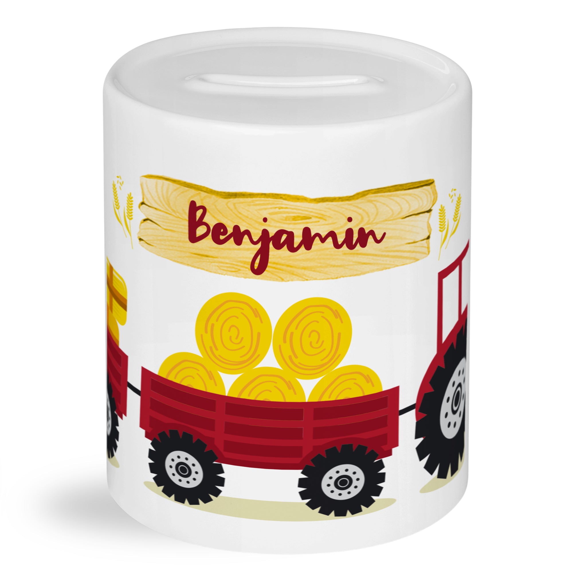 Spardose mit rotem Traktor und gelben Heuballen.