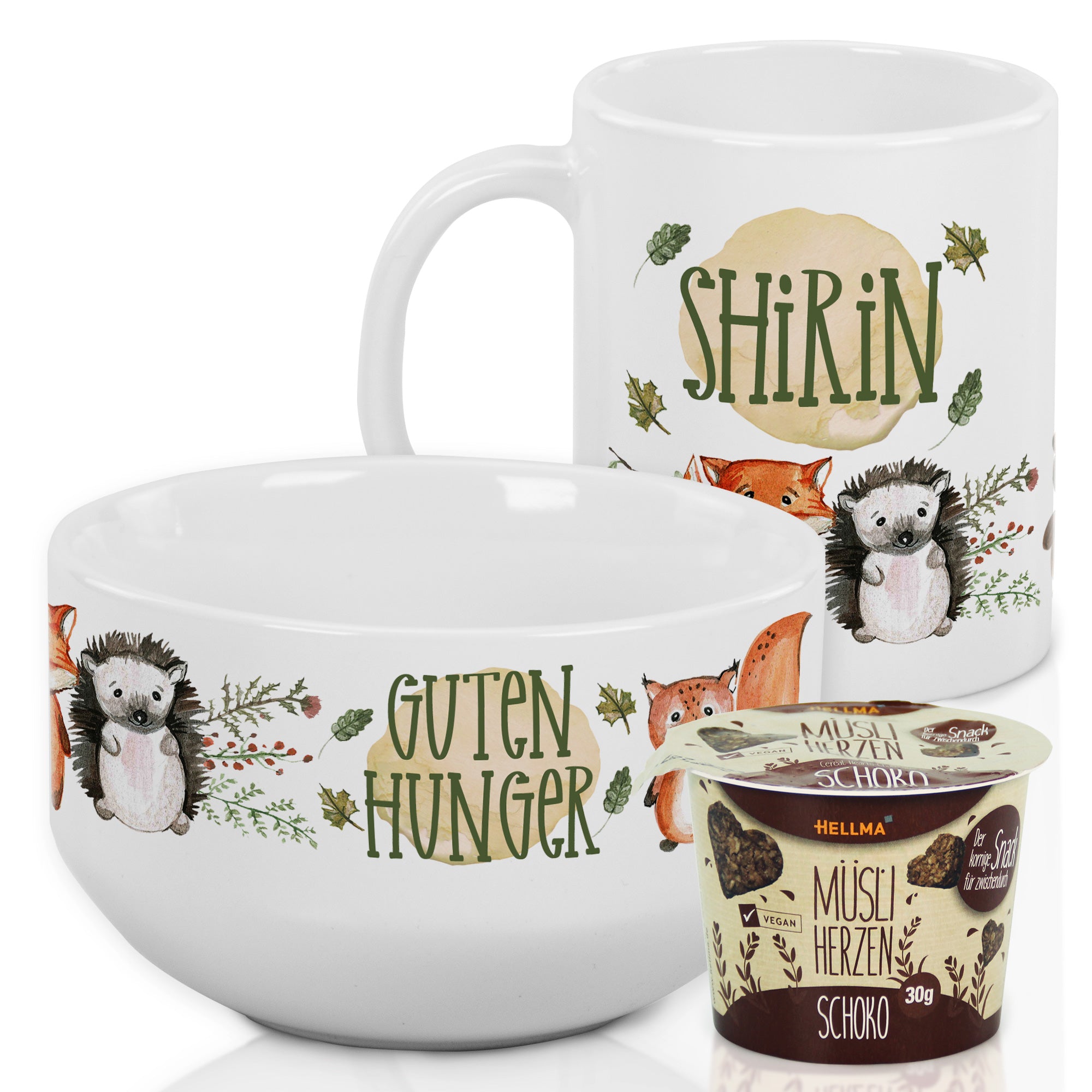 Tasse und Schüssel mit Tiermotiven, weiße Keramik.