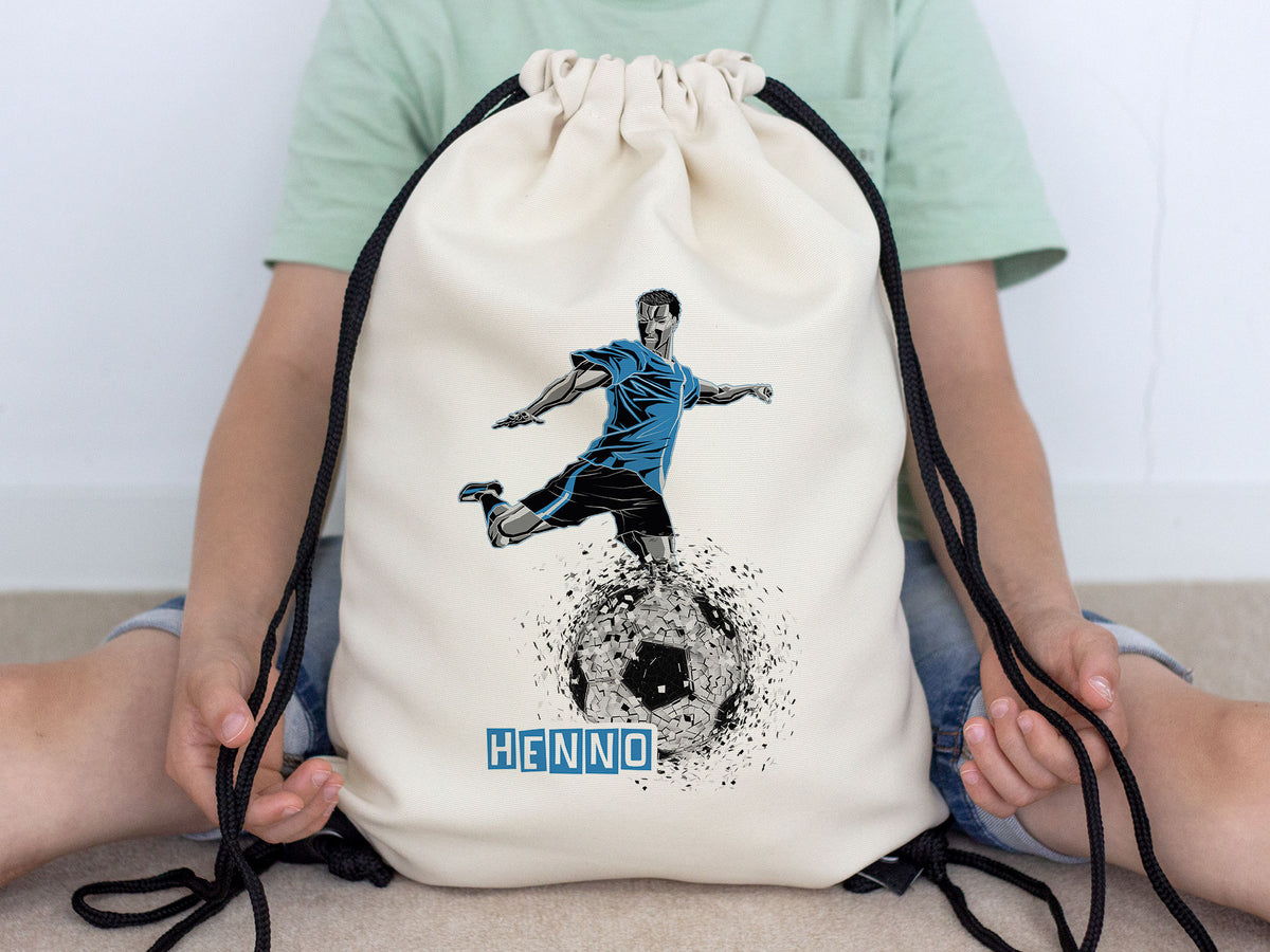 Beige Turnbeutel mit Fußballmotiv und blauem Spieler.
