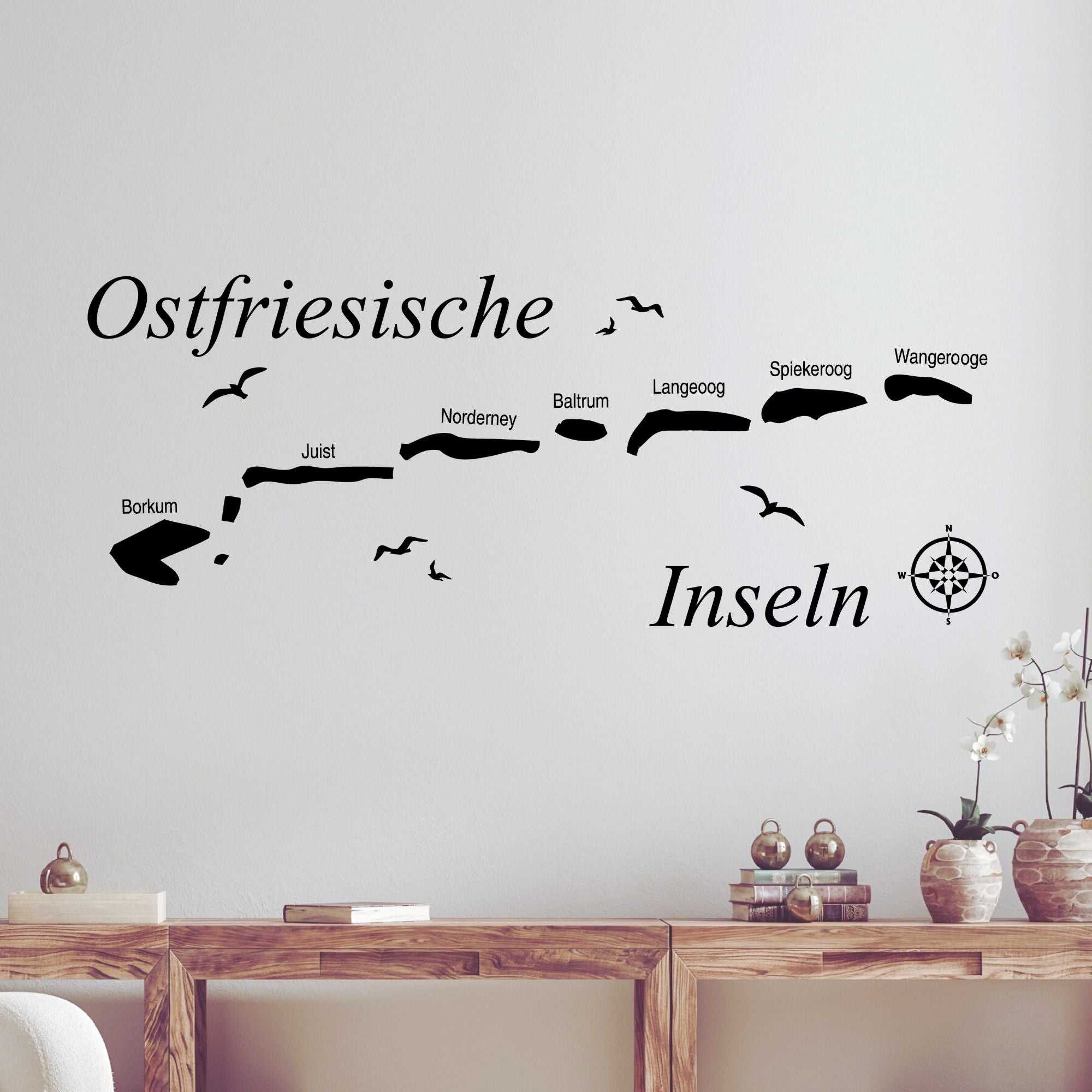 Wandtattoo Ostfriesische Inseln in Schwarz mit Kompass.