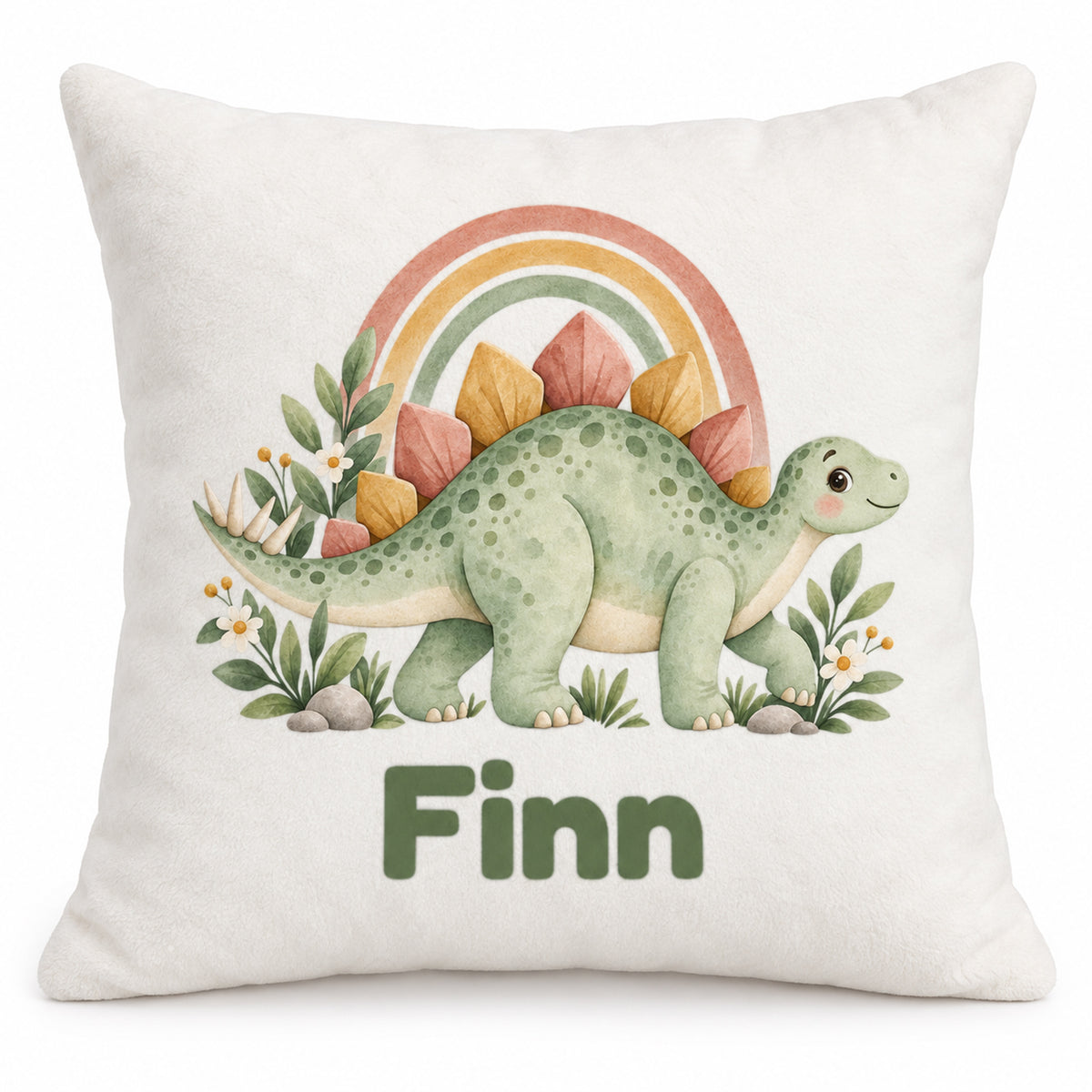 Personalisierter Dino-Kissenbezug: Stegosaurus mit Regenbogen, Beispielname Finn – Produktfoto auf weißem Hintergrund