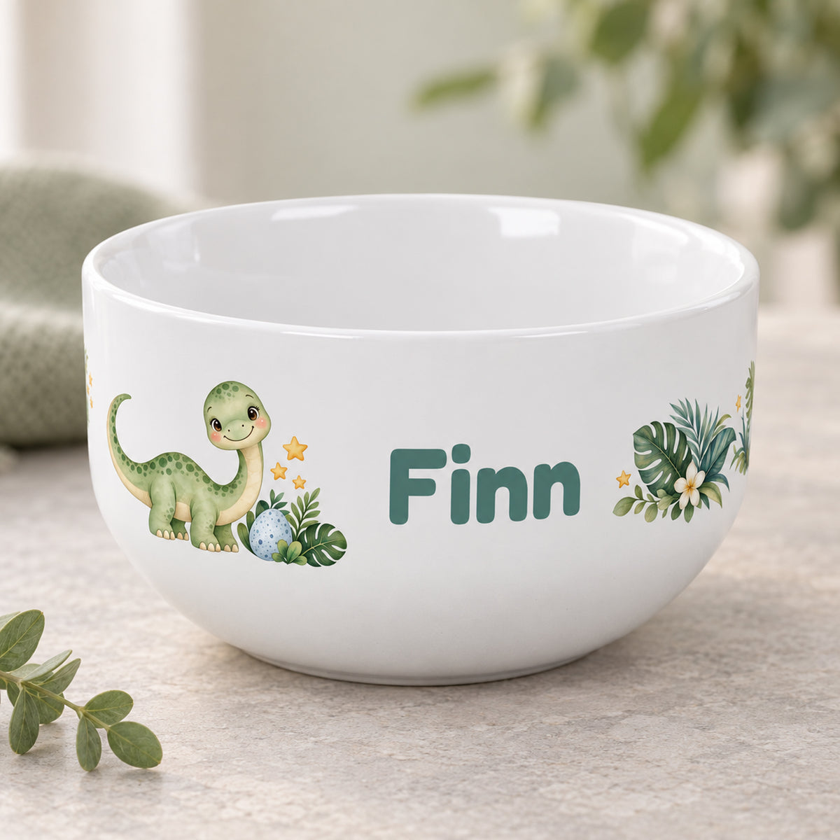 Weiße Müslischale mit Dinosaurier-Motiv und Beispielname Finn