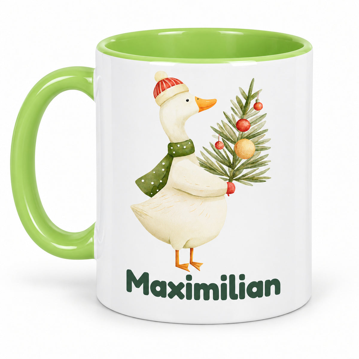 Rückansicht derselben hellgrünen Tasse mit Gans mit Tannenzweig und Beispielname Maximilian