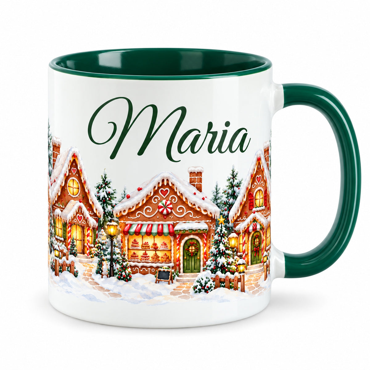 Weiße Tasse mit grünem Henkel, Lebkuchenhäuschen und Zuckergussdächern und personalisiertem Namen.