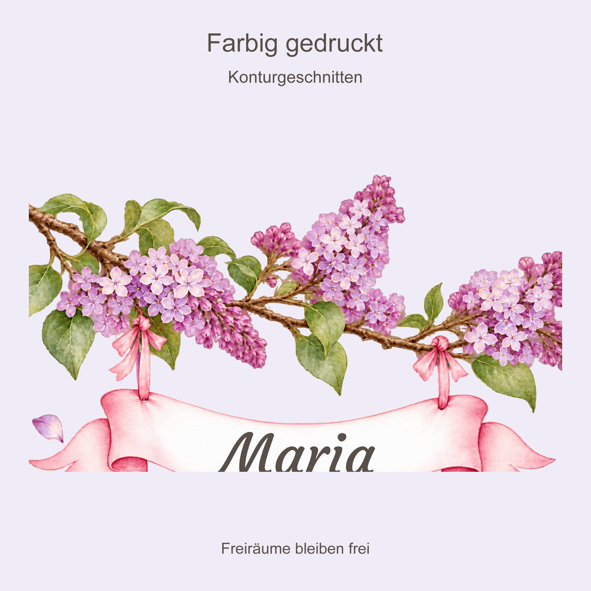 Detail des farbig gedruckten Flieder-Wandtattoos mit weißem Namensband und Hinweis auf freie Zwischenräume.