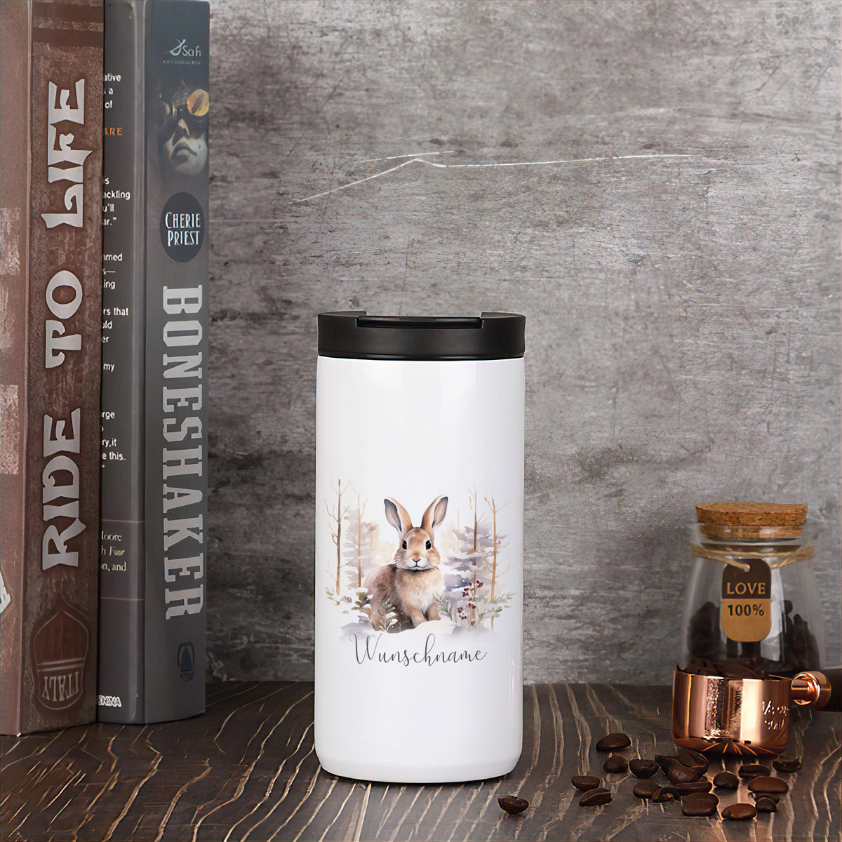 Weißer Thermobecher mit Hase und der Aufschrift "Wunschkanne".