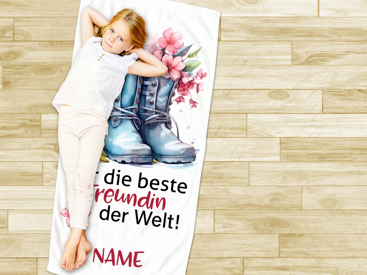 Handtuch mit Blumen und Stiefeln