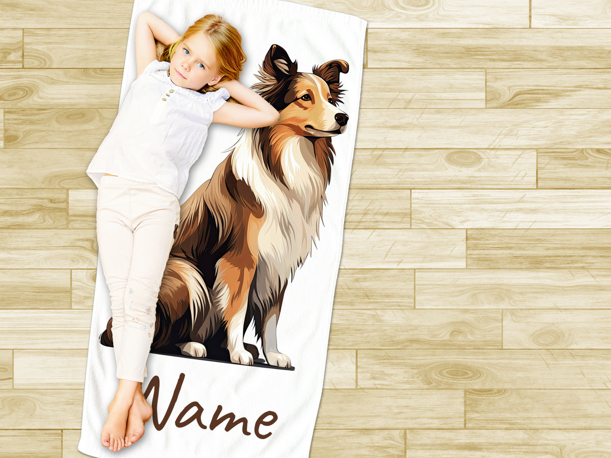 Mädchen auf personalisiertem Handtuch mit Collie-Motiv.