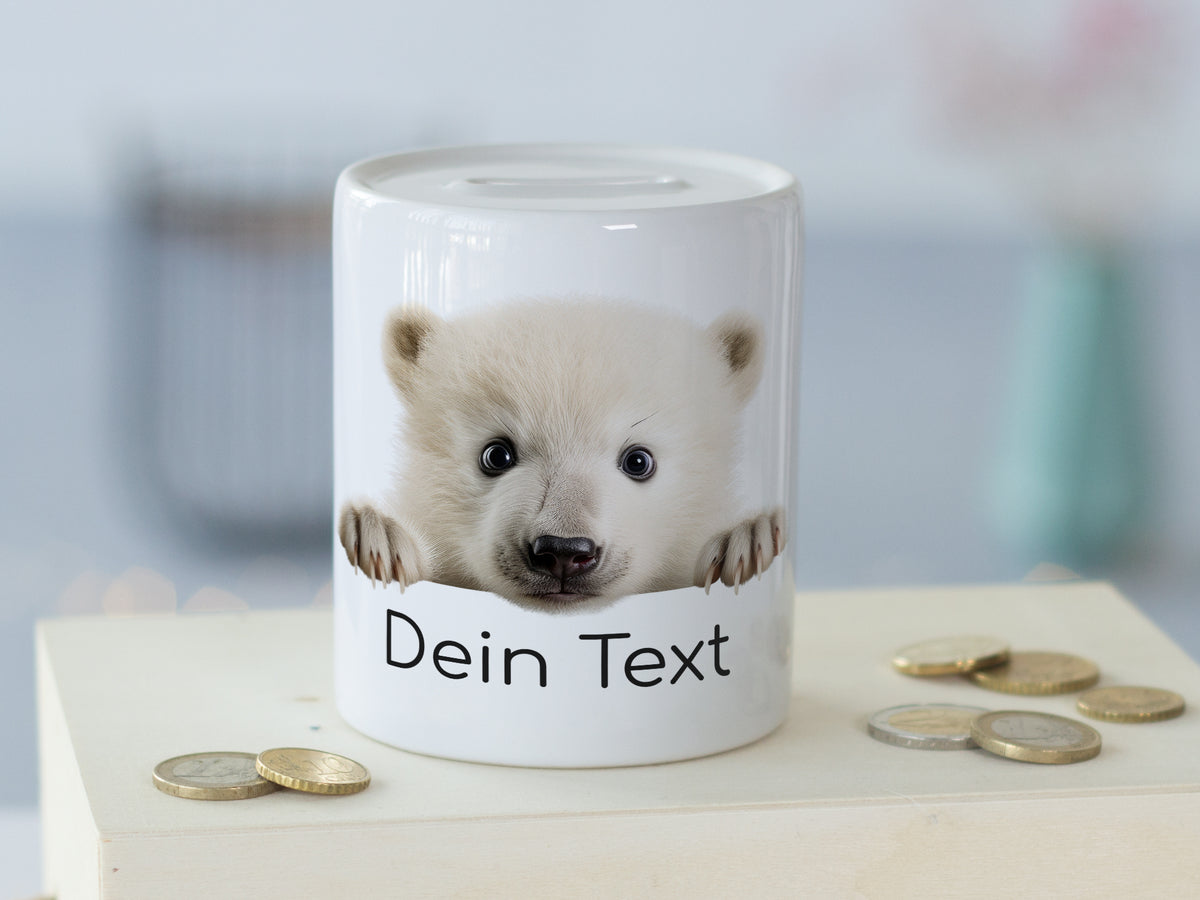 Weißes Sparschwein mit Eisbärenmotiv und personalisierbarem Text.