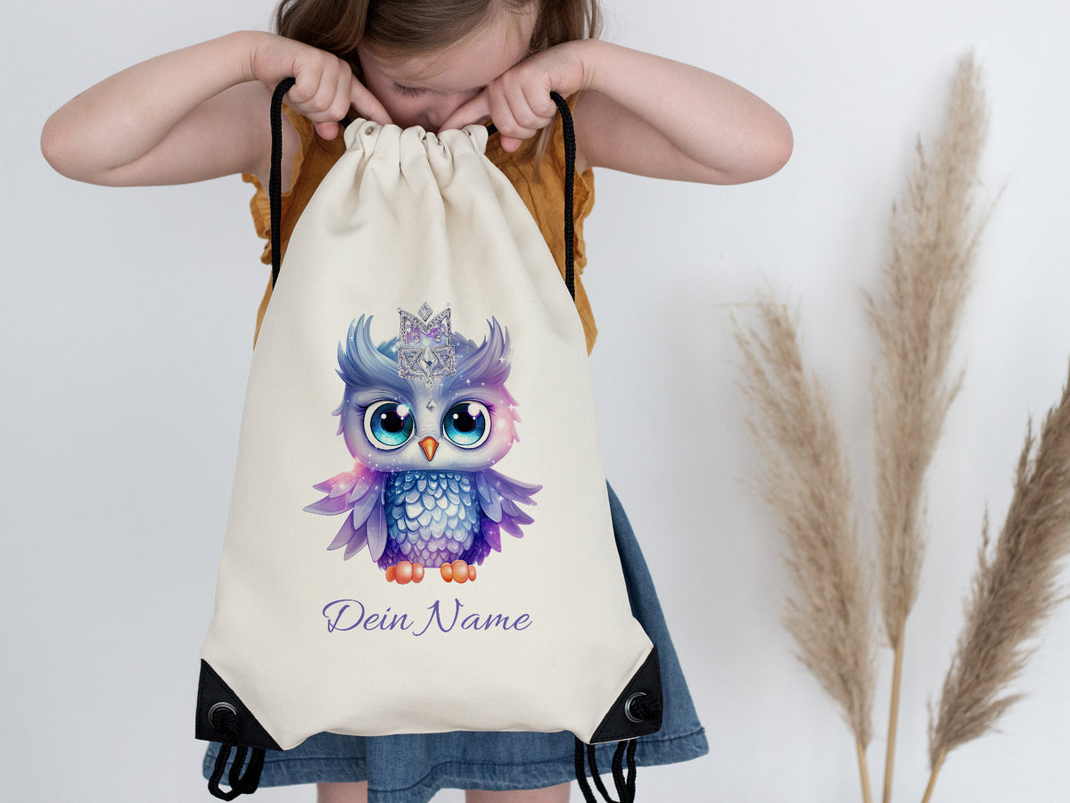Säuglings-Rucksack mit lila Eule und personalisiertem Namen.