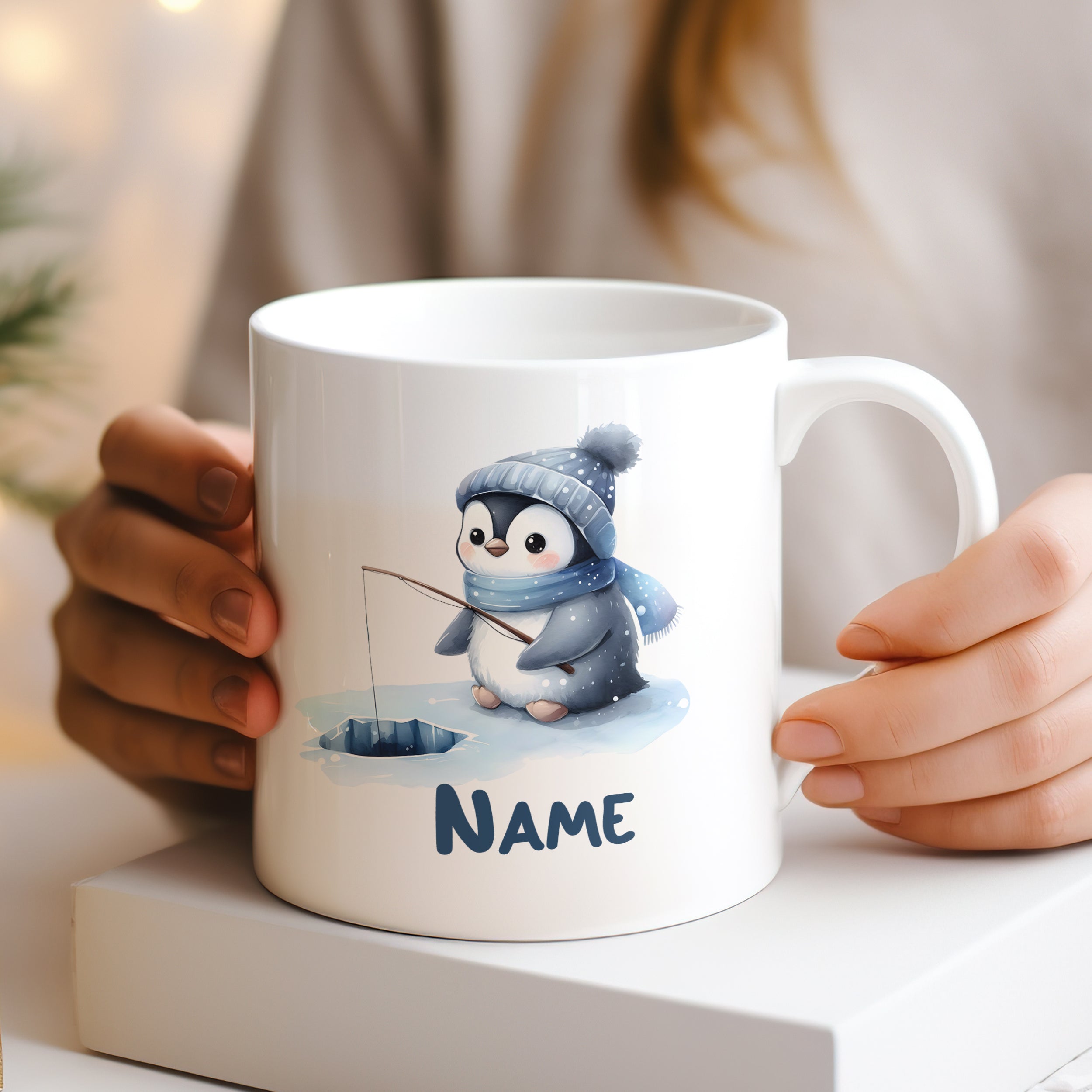 Tasse mit Pinguin-Motiv, blau, personalisierbar mit Namen.