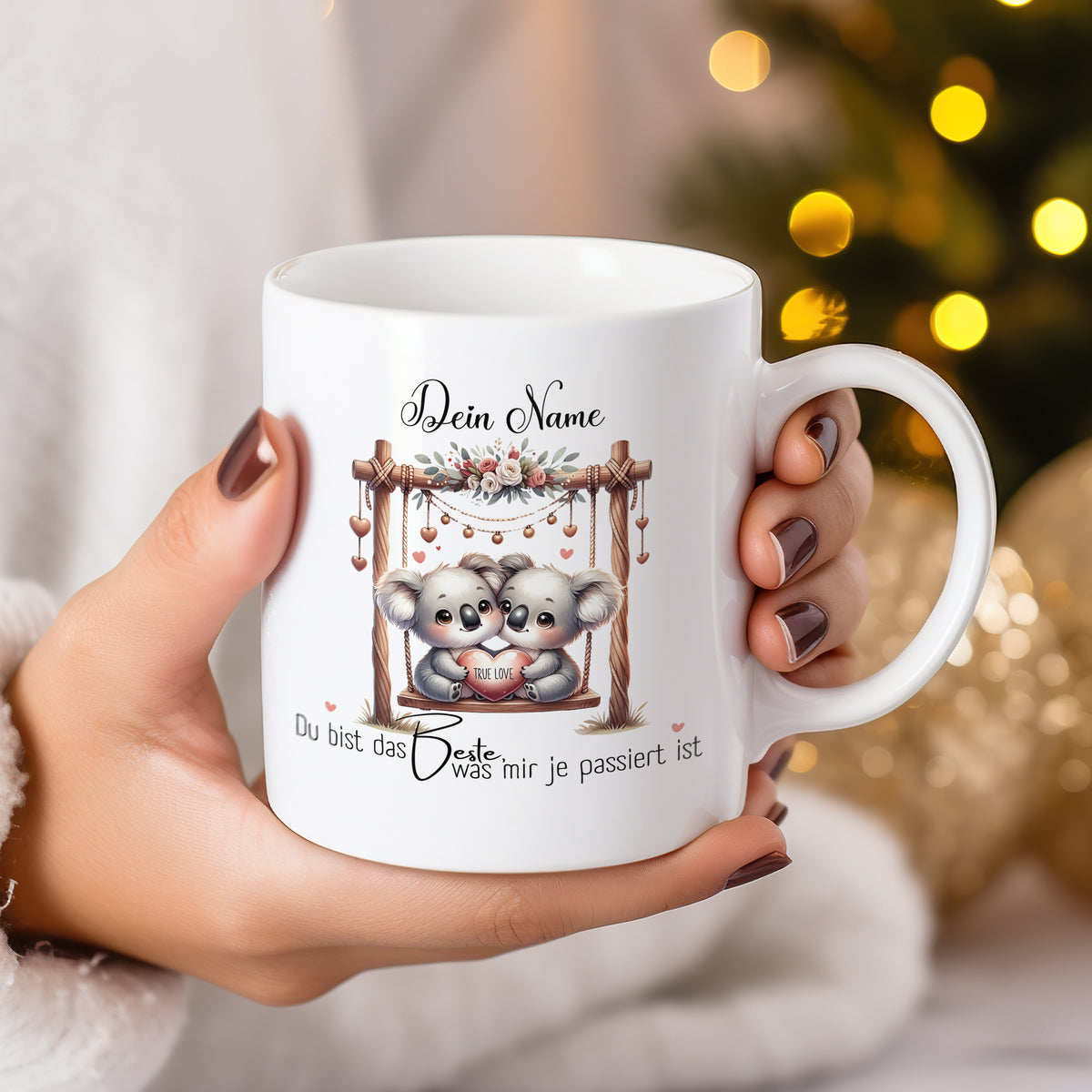 Weiße Tasse mit Koalas und persönlicher Botschaft.