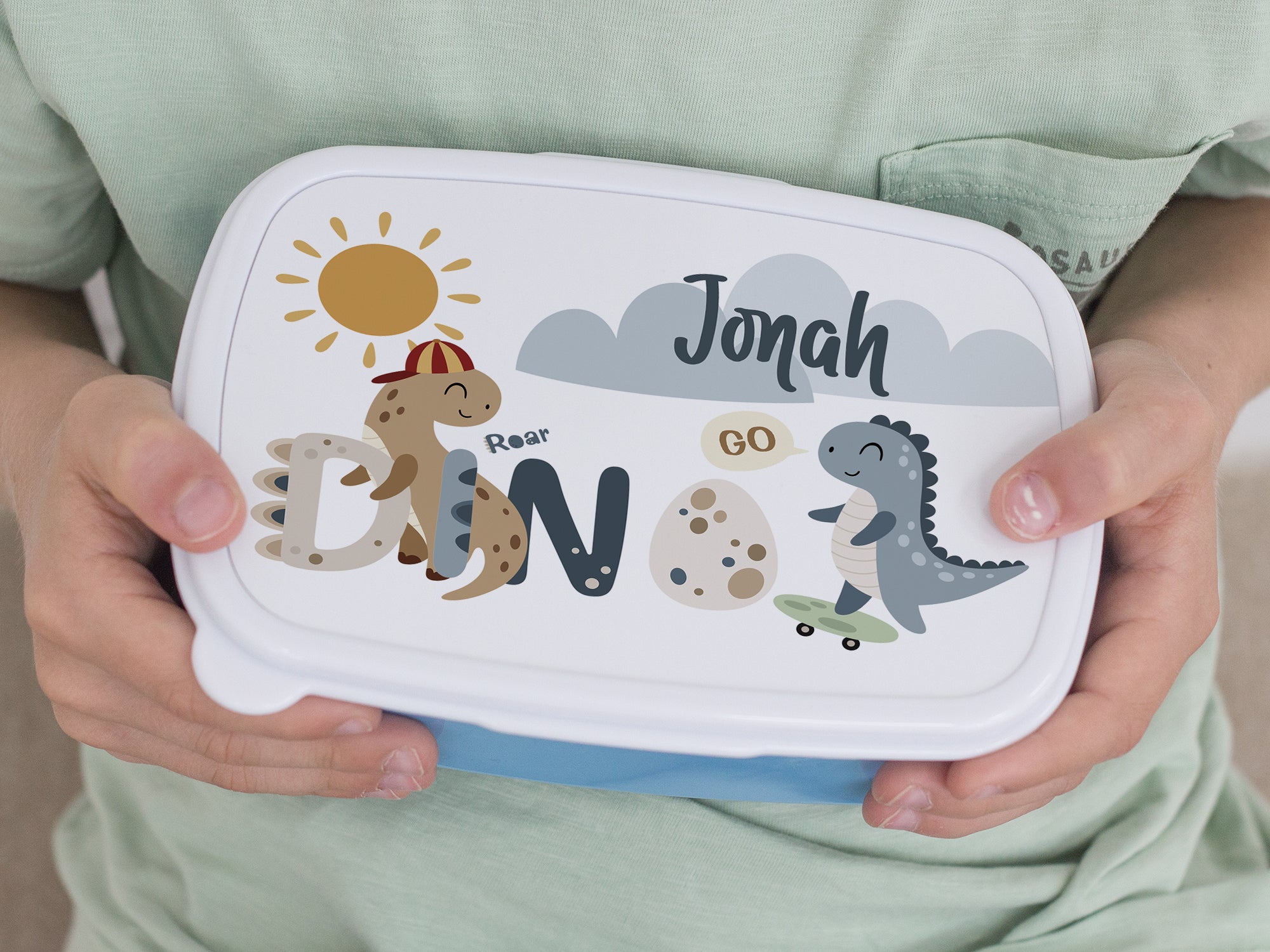 Bunte Brotdose mit Dinosauriern und Namen Jonah.
