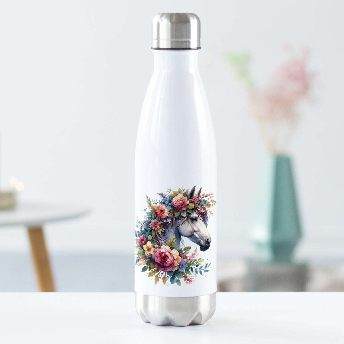 Weiße Edelstahl-Trinkflasche mit Einhorn und Blumenmotiv.