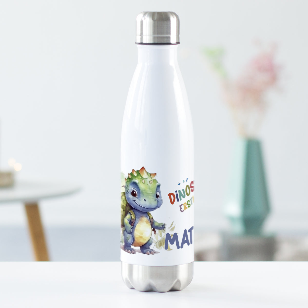 Weiße Edelstahl-Trinkflasche mit Dinosaurier-Design und buntem Text.