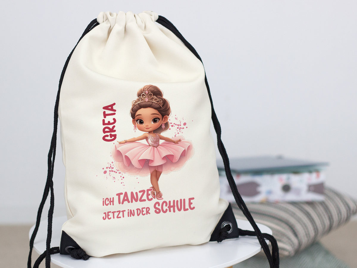 Beiger Turnbeutel mit Ballettmädchen und personalisiertem Text.