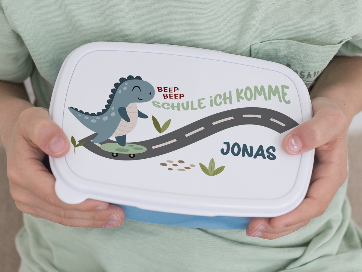 Lunchbox mit Dinosaurier-Motiv und personalisiertem Namen Jonas.