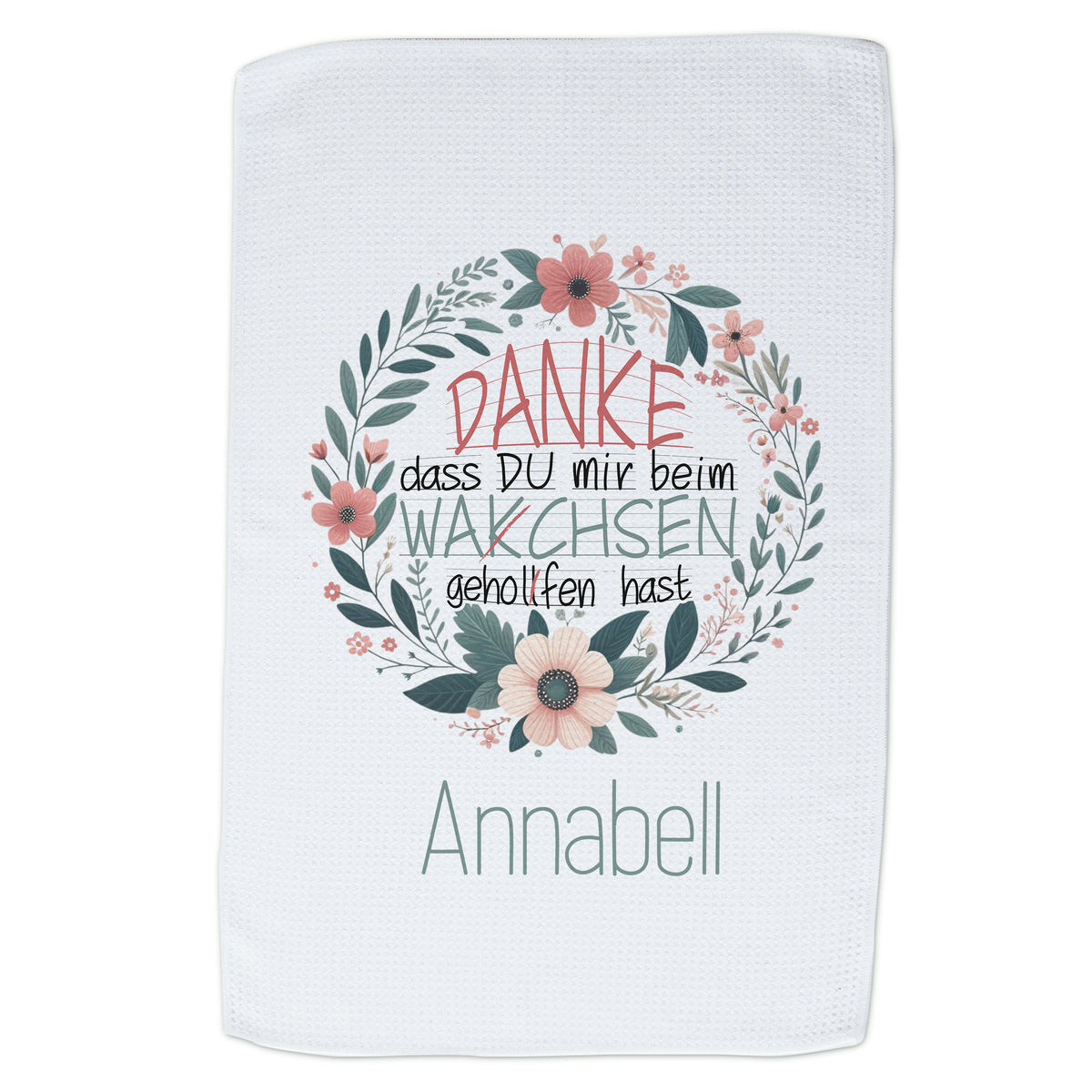 Weißes Handtuch mit floralem Design und Dankesbotschaft.