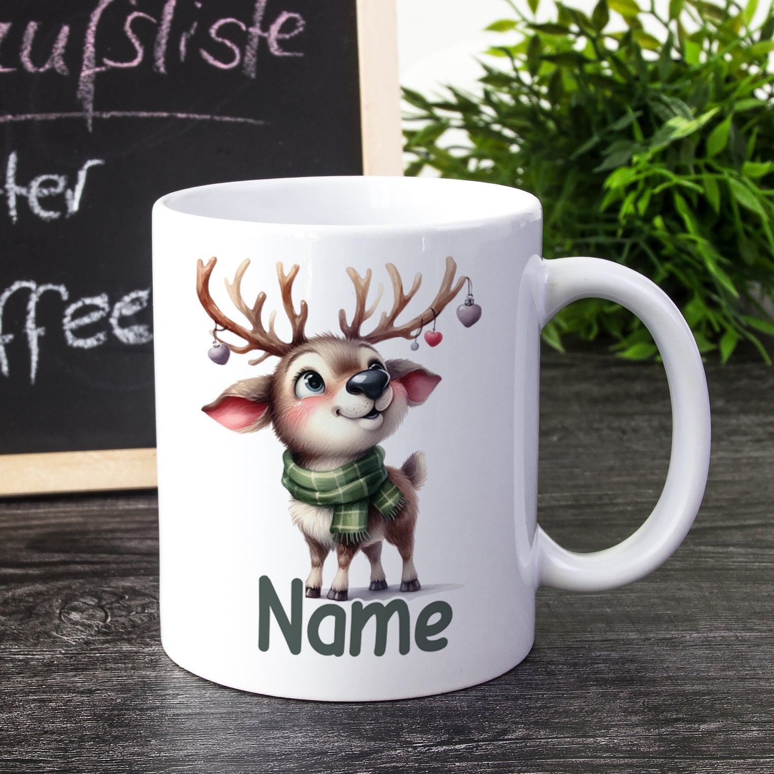 Tasse mit niedlichem Rentier und personalisierbarem Namen.