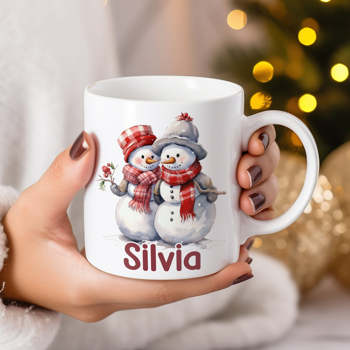 Tasse mit Schneemännern und dem Namen Silvia.