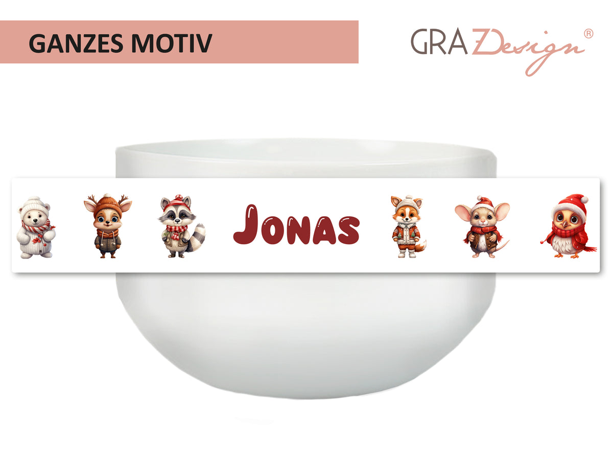 Weiße Schüssel mit buntem Tiermotiv und dem Namen "Jonas".