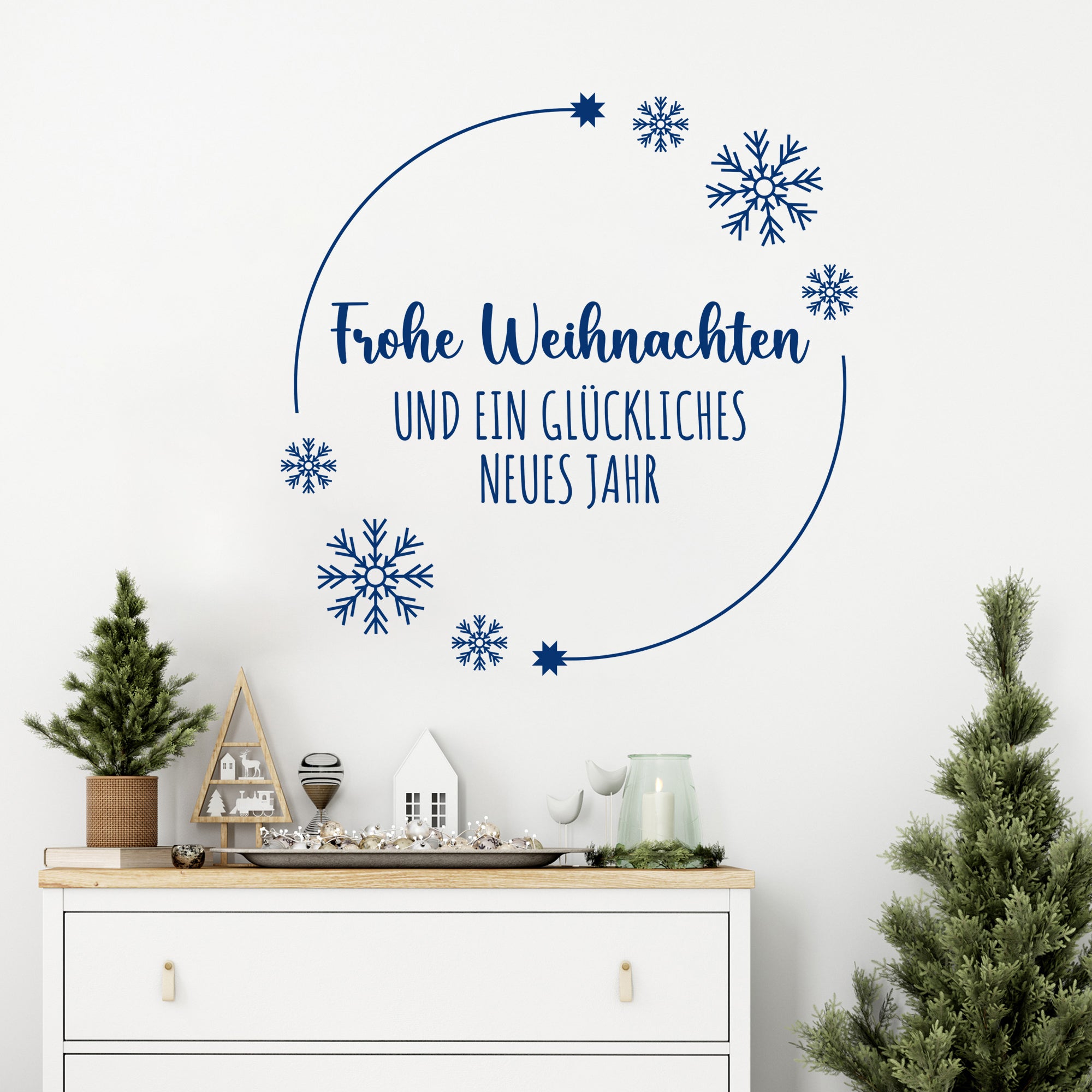 Frohe Weihnachten Wandtattoo in Blau mit Schneeflocken.