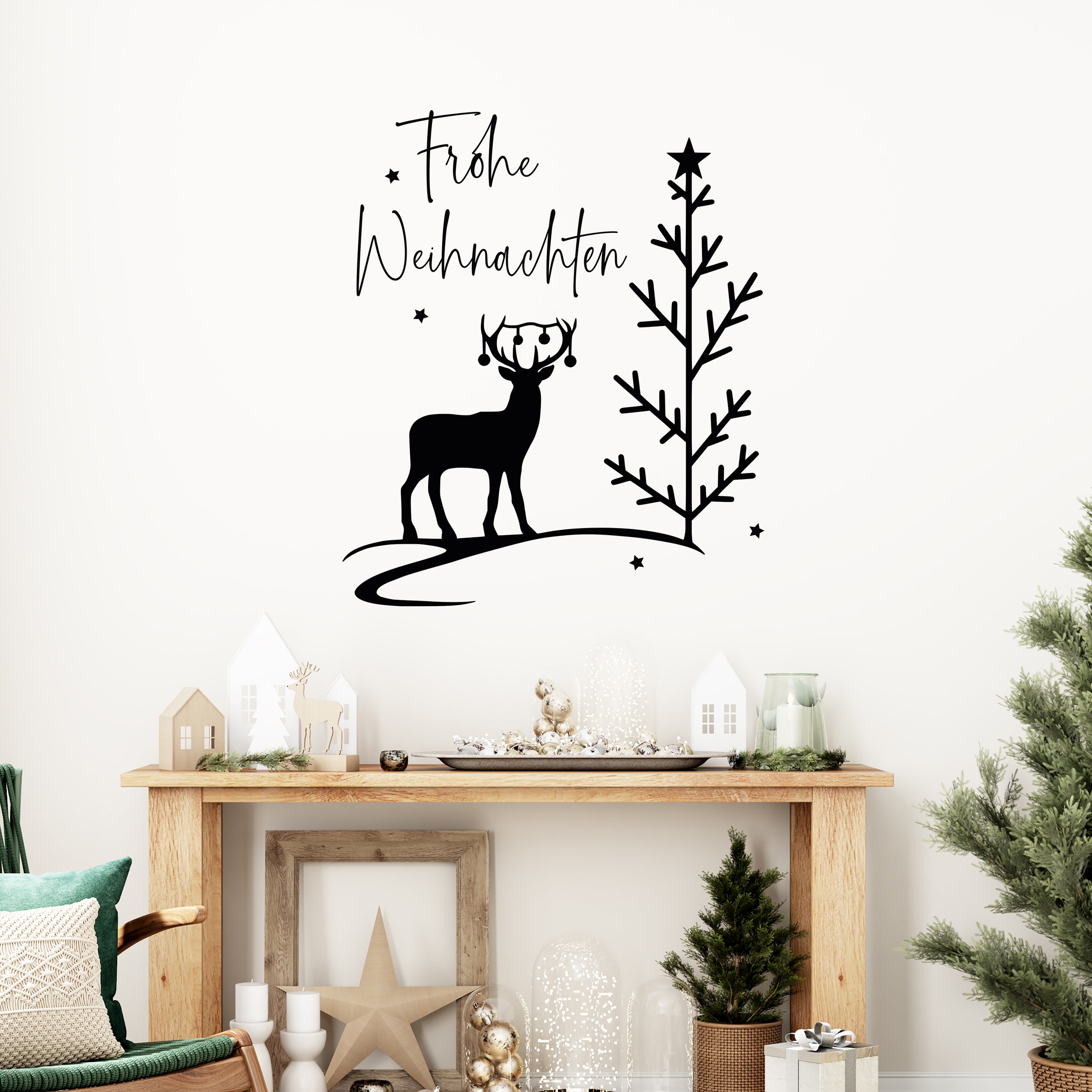 Schwarzer Weihnachtswandaufkleber mit Rentier und Baum.