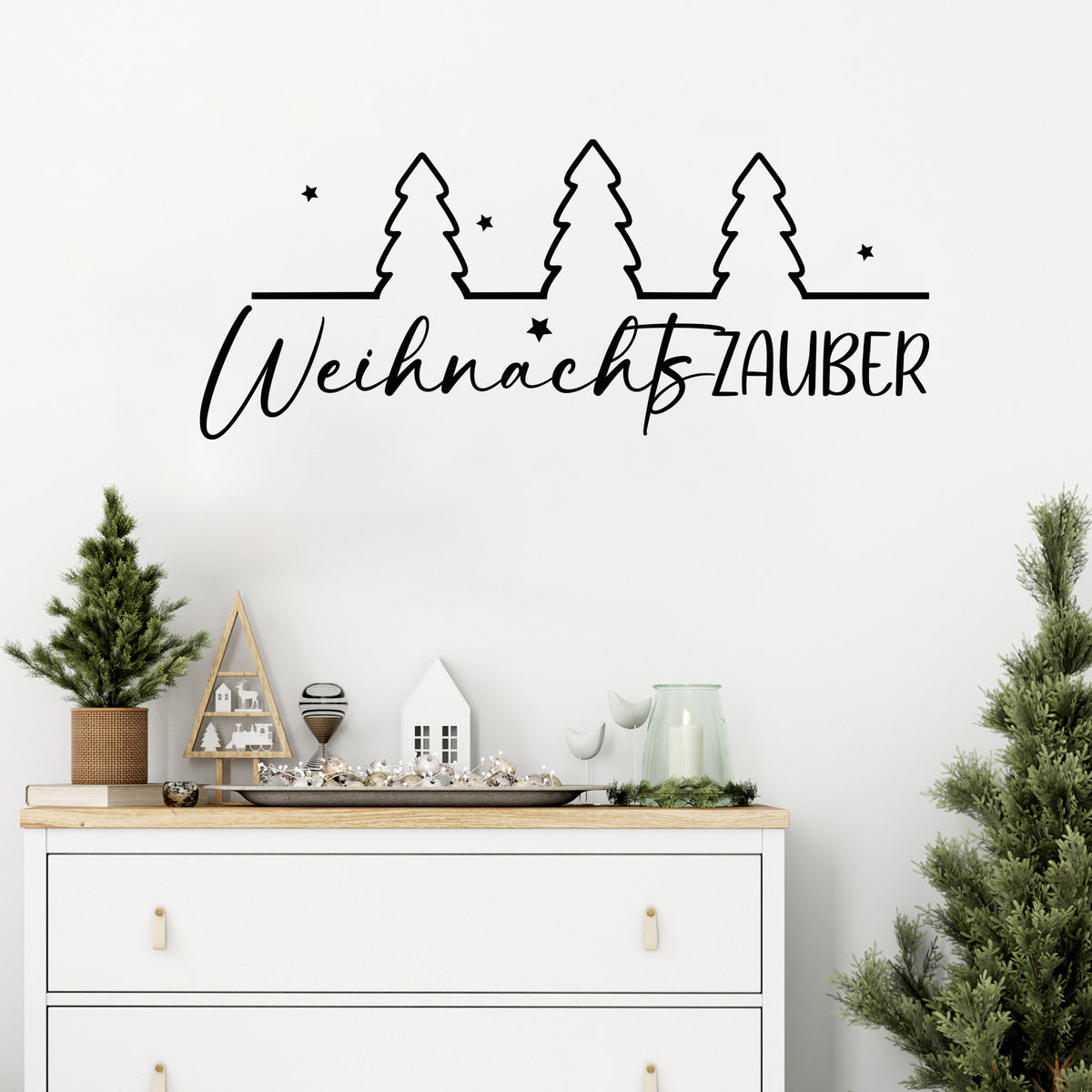 Weihnachtszauber Wanddeko mit Tannenbäumen in Schwarz.