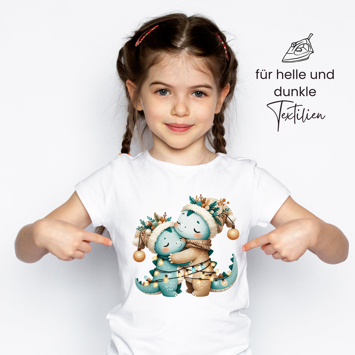 T-Shirt mit niedlichen Dinosauriern in Pastellfarben.