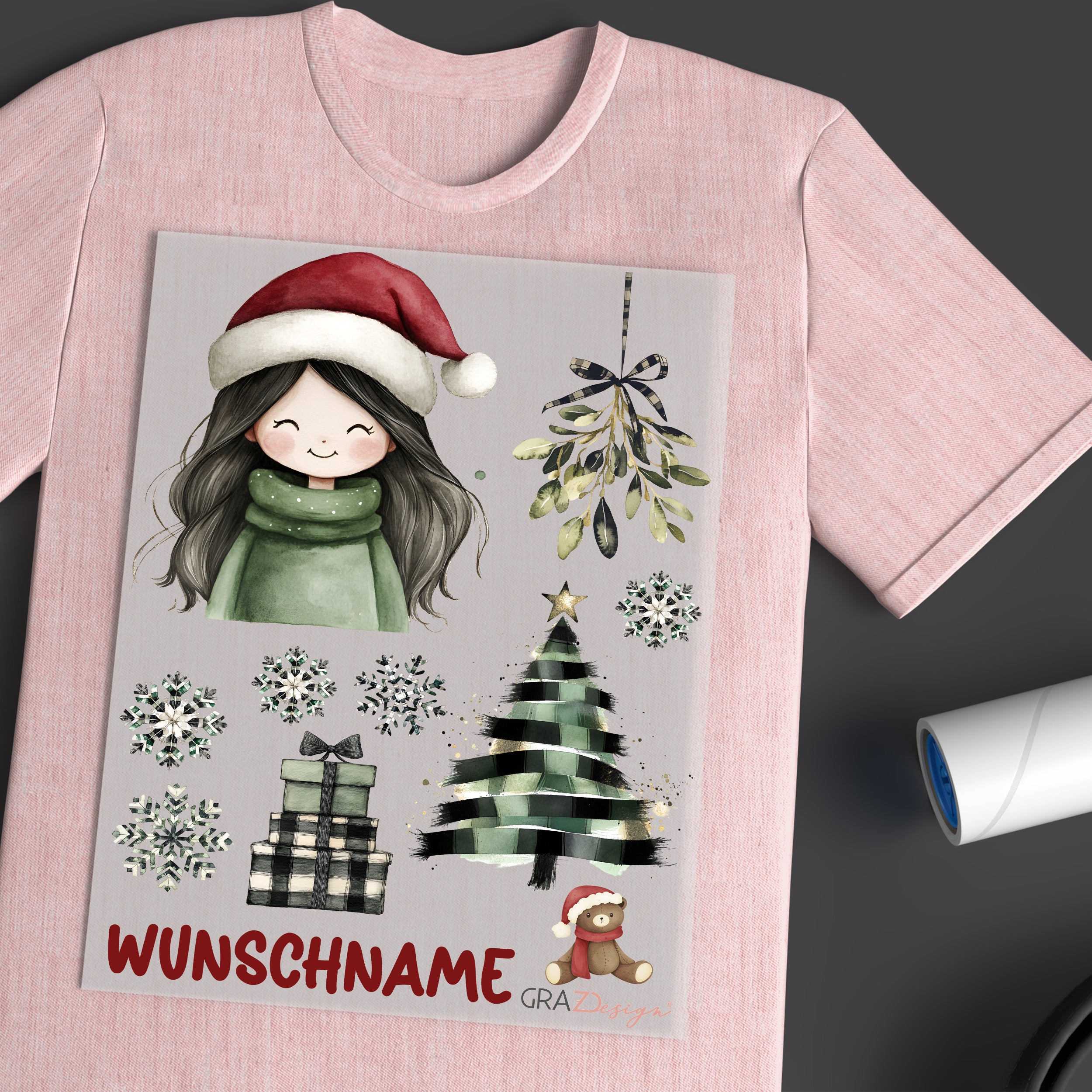 Rosa T-Shirt mit Weihnachtsmotiv und personalisierbarem Text.