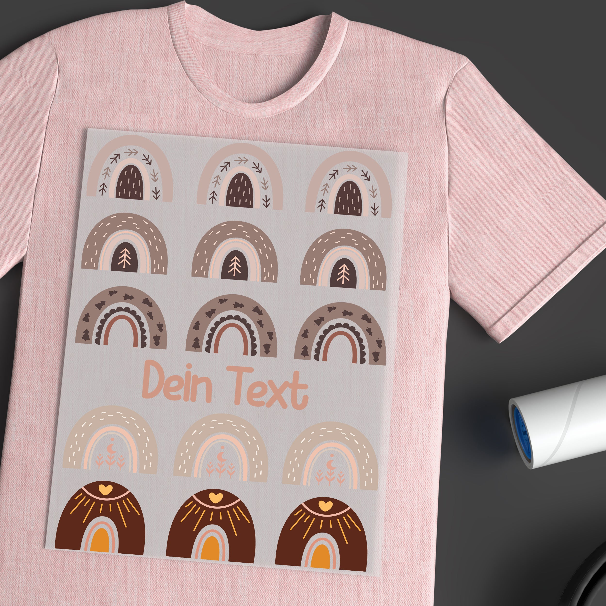 Rosa T-Shirt mit buntem Regenbogen-Design und Text.
