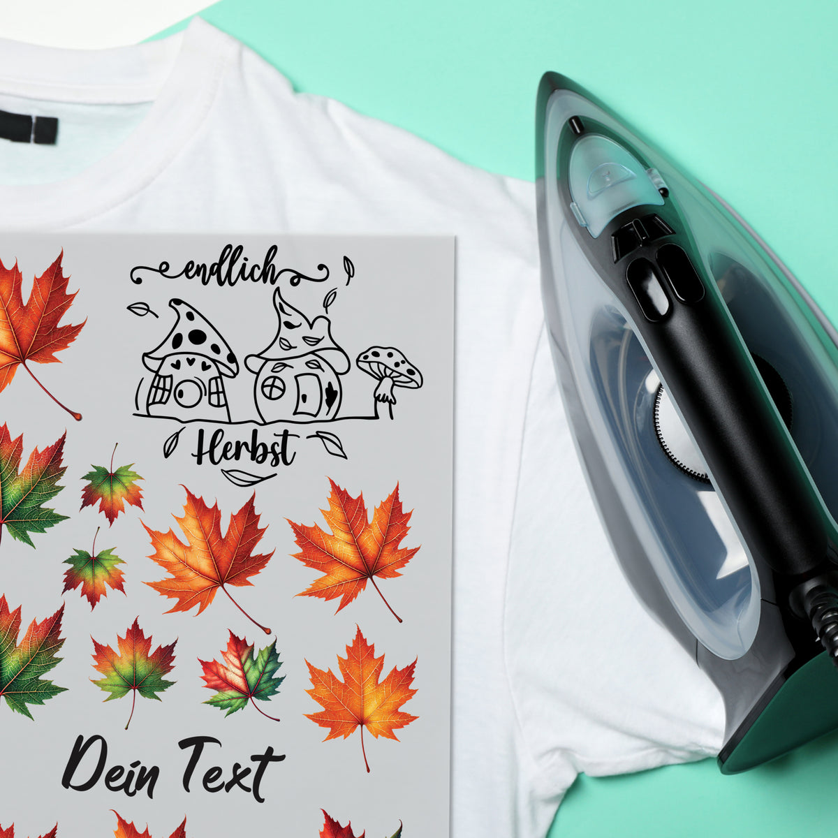 T-Shirt mit Herbstmotiv, bunte Blätter und Text.