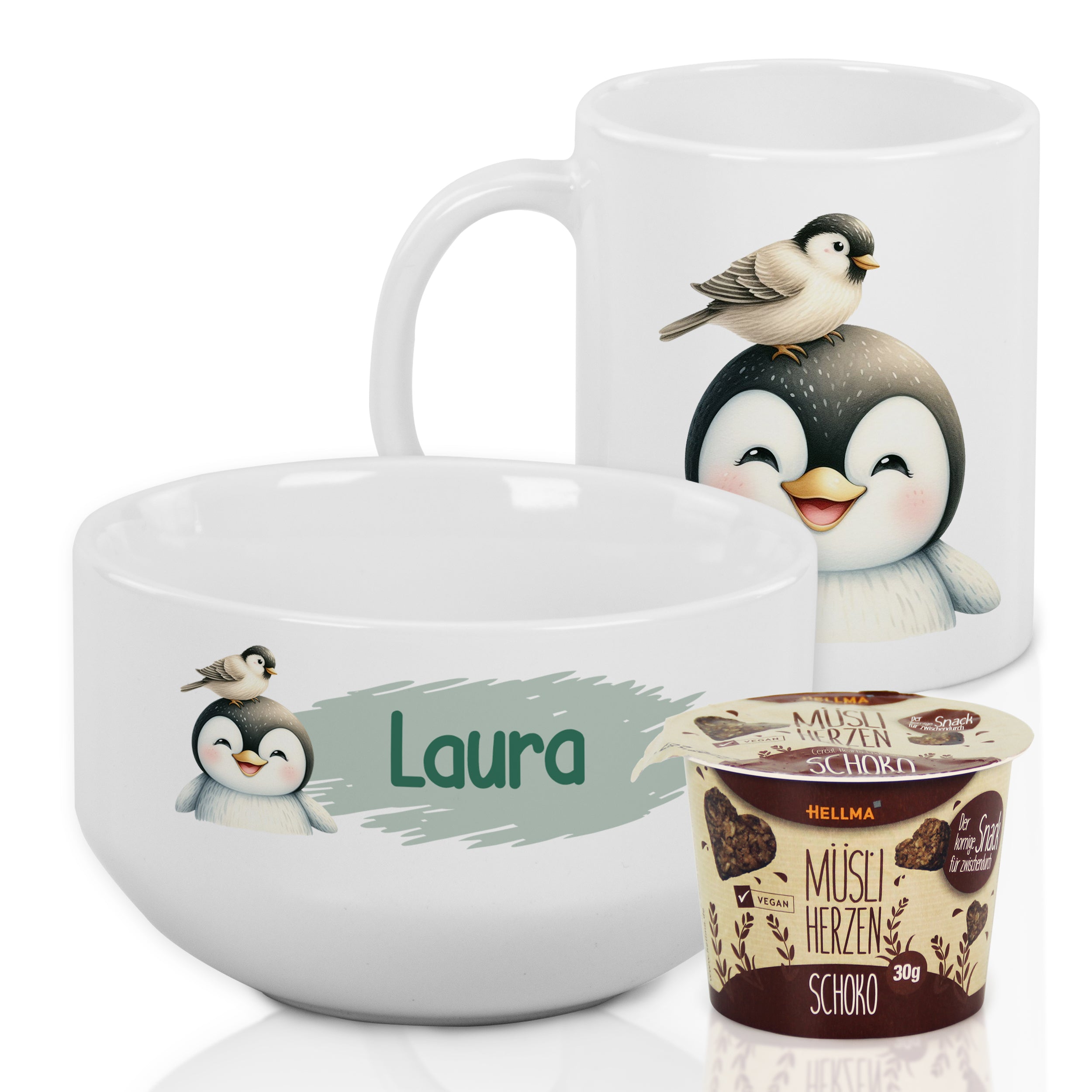 Weißes Geschirrset mit Pinguin-Motiven und personalisiertem Namen.