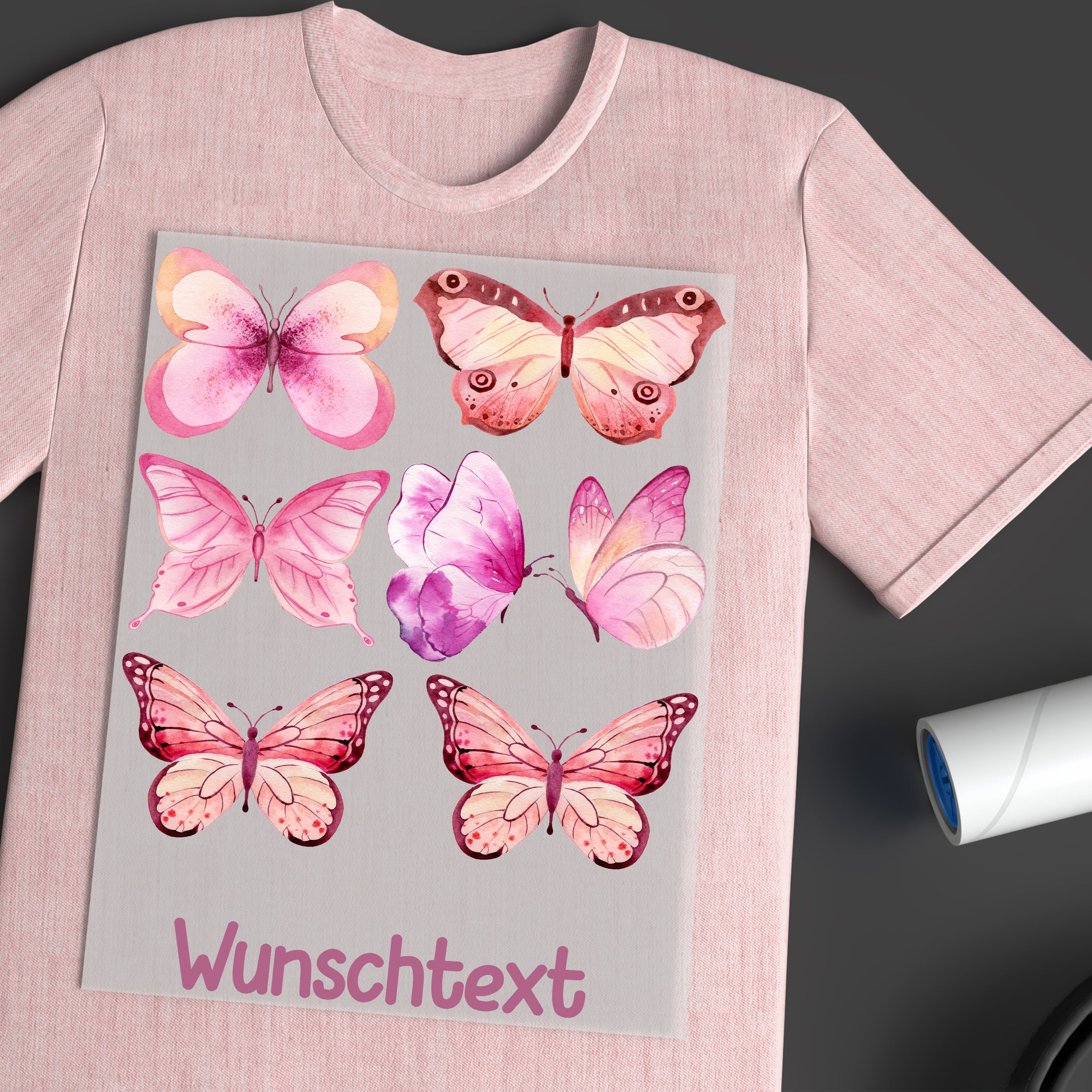 Rosa T-Shirt mit bunten Schmetterlingen und Wunschtext.