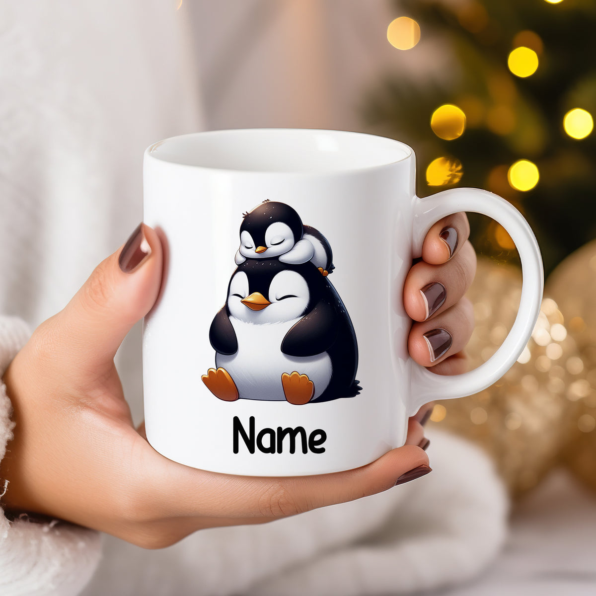 Tasse mit niedlichen Pinguinen und personalisierbarem Namen.
