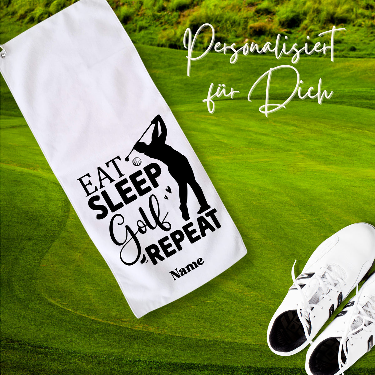 Weißes Golfhandtuch mit schwarzem Aufdruck und personalisiertem Namen.