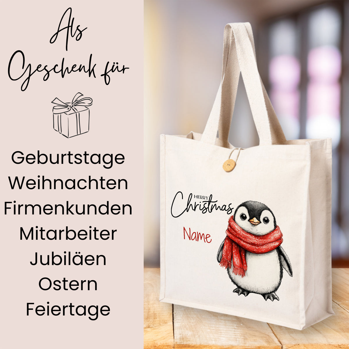 Beige Stofftasche mit Pinguin und rotem Schal.