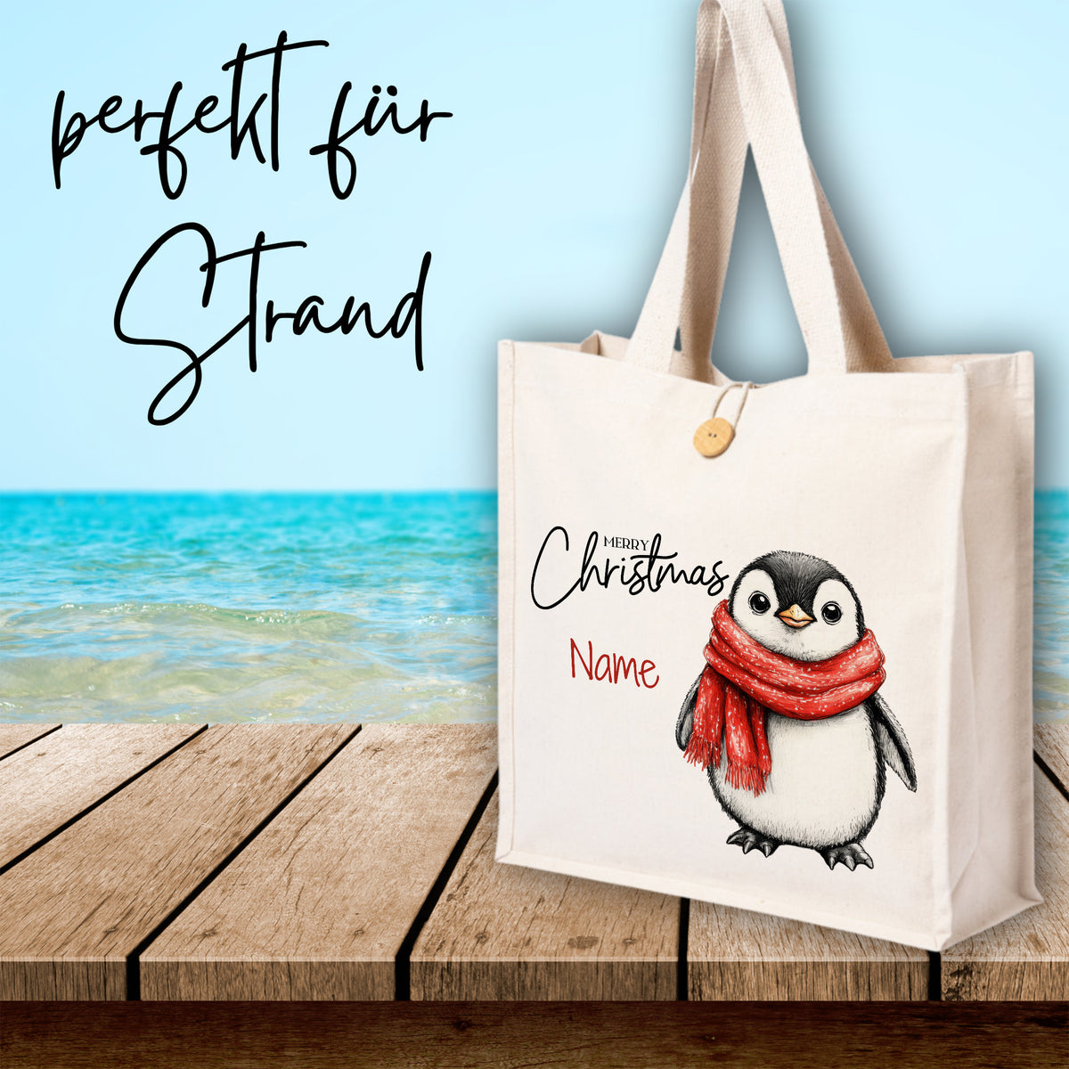 Stofftasche mit Pinguin-Motiv und rotem Schal.