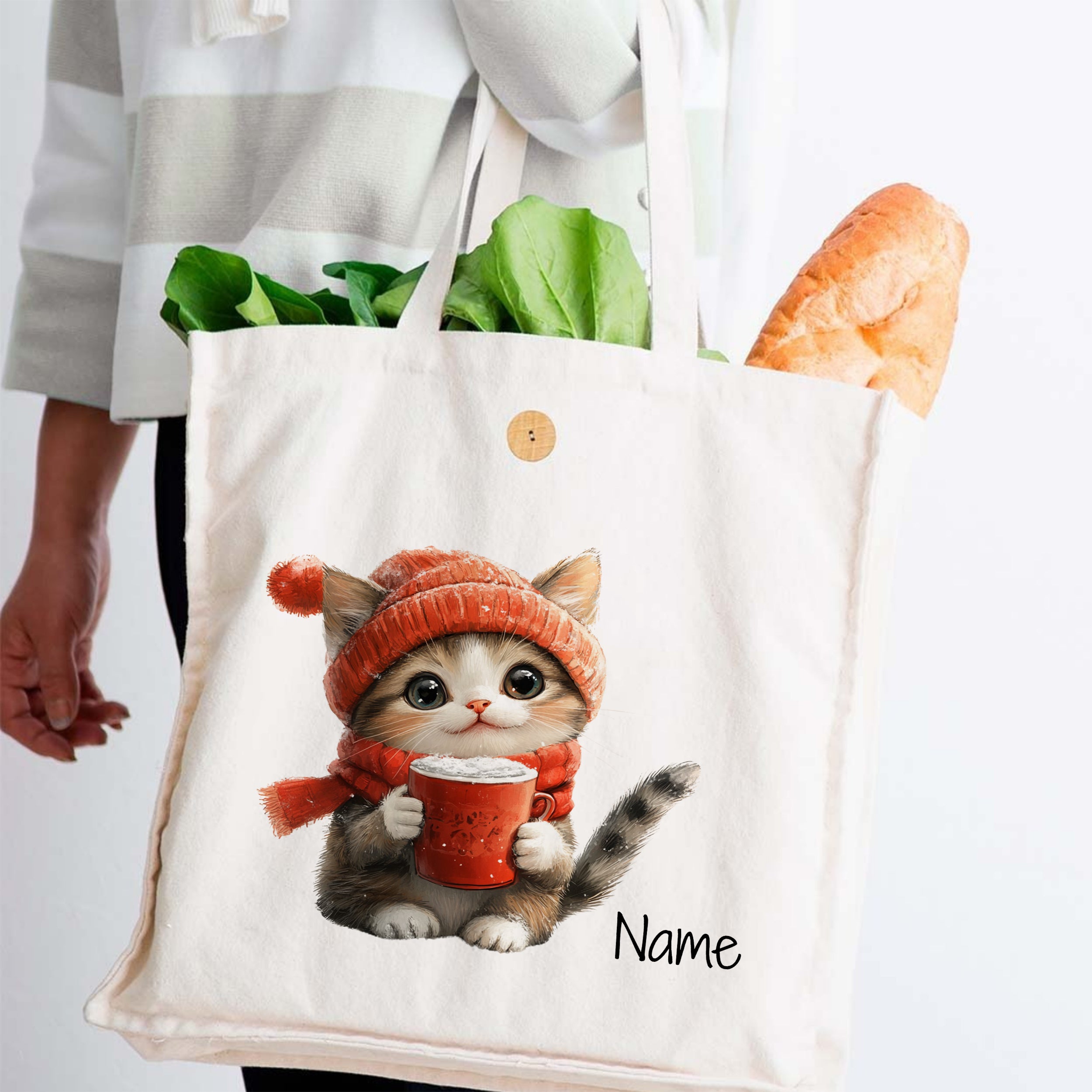 Katze mit rotem Becher, beige Tasche, frische Lebensmittel.