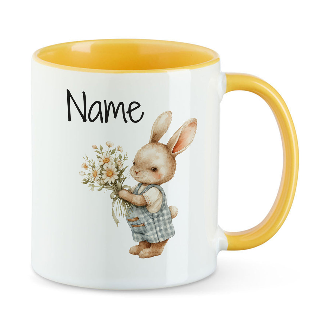 Tasse mit gelbem Henkel, Hase und Blumenmotiv.