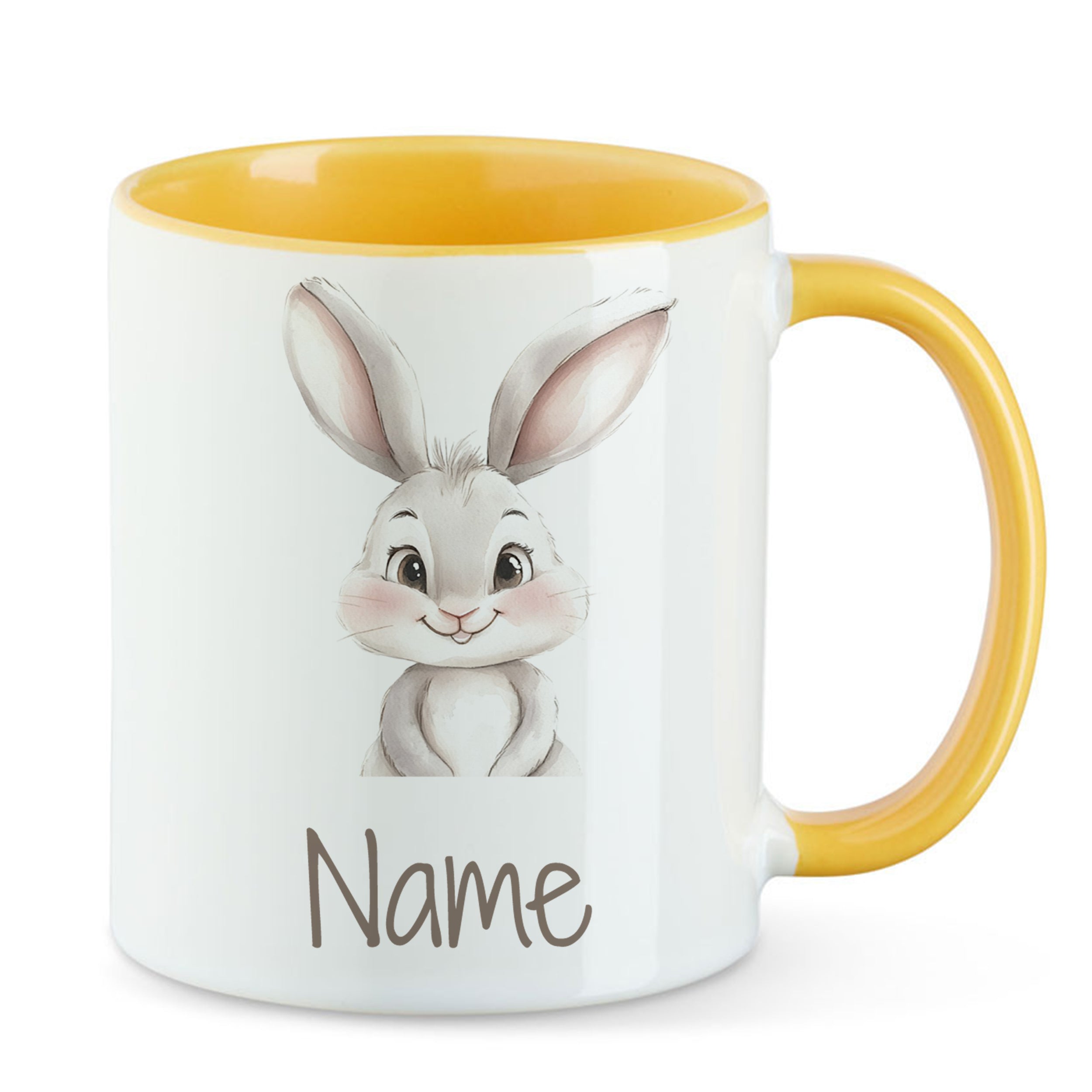Tasse mit gelbem Henkel, niedlichem Hasenmotiv und Platz für Namen.