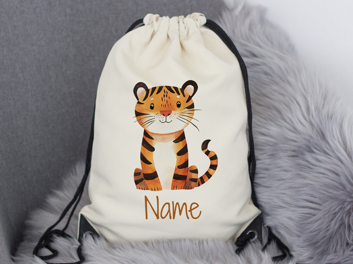 Beige Turnbeutel mit Tiger-Motiv und personalisierbarem Namen.