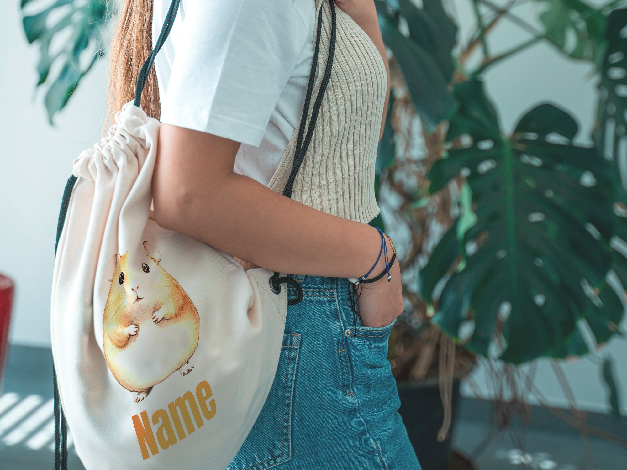 Beige Tasche mit Hamster-Motiv und personalisierbarem Namen.
