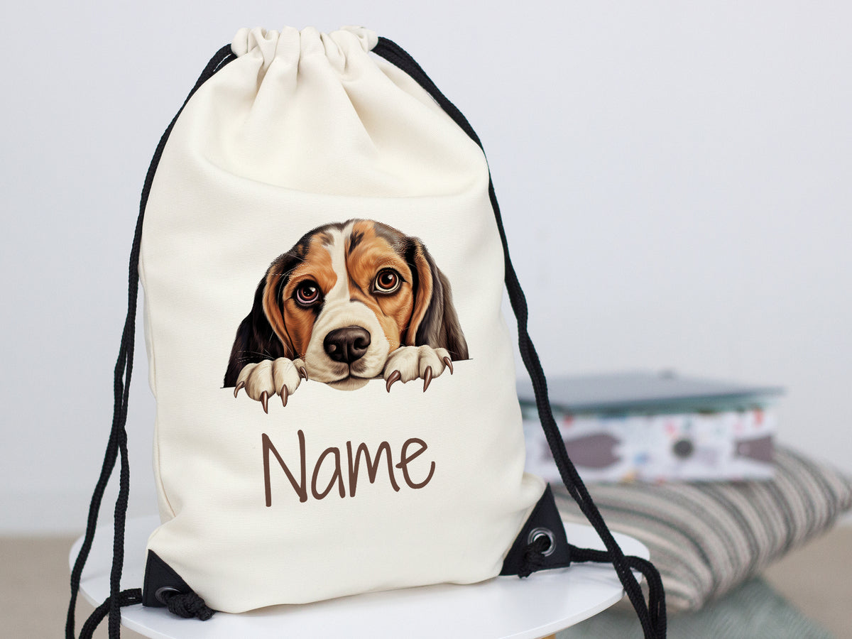 Beige Rucksack mit Beagle-Motiv und personalisierbarem Namen.