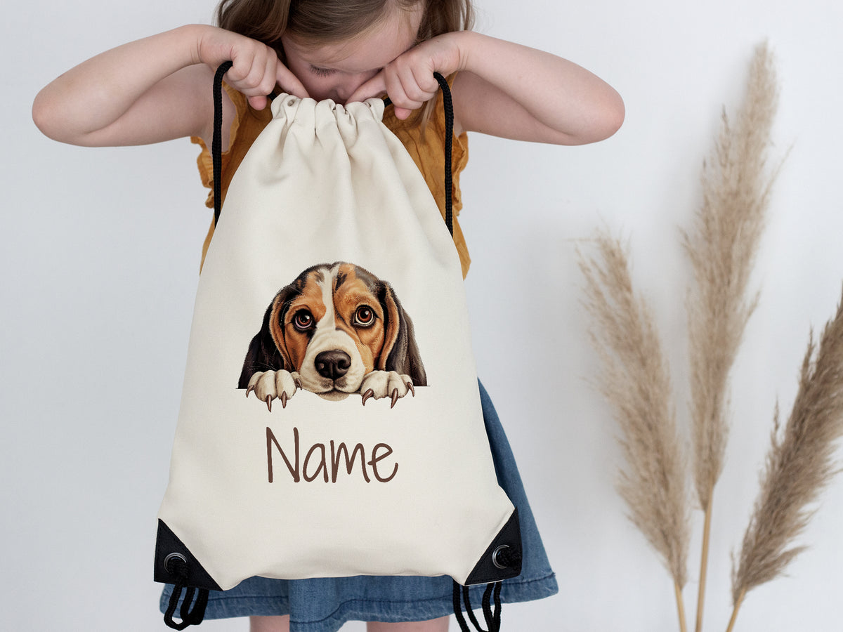 Beige Rucksack mit Beagle-Motiv und personalisierbarem Namen.