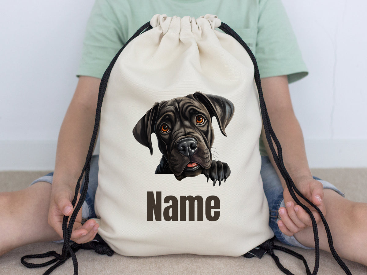 Beige Rucksack mit Hundemotiv und personalisierbarem Namen.