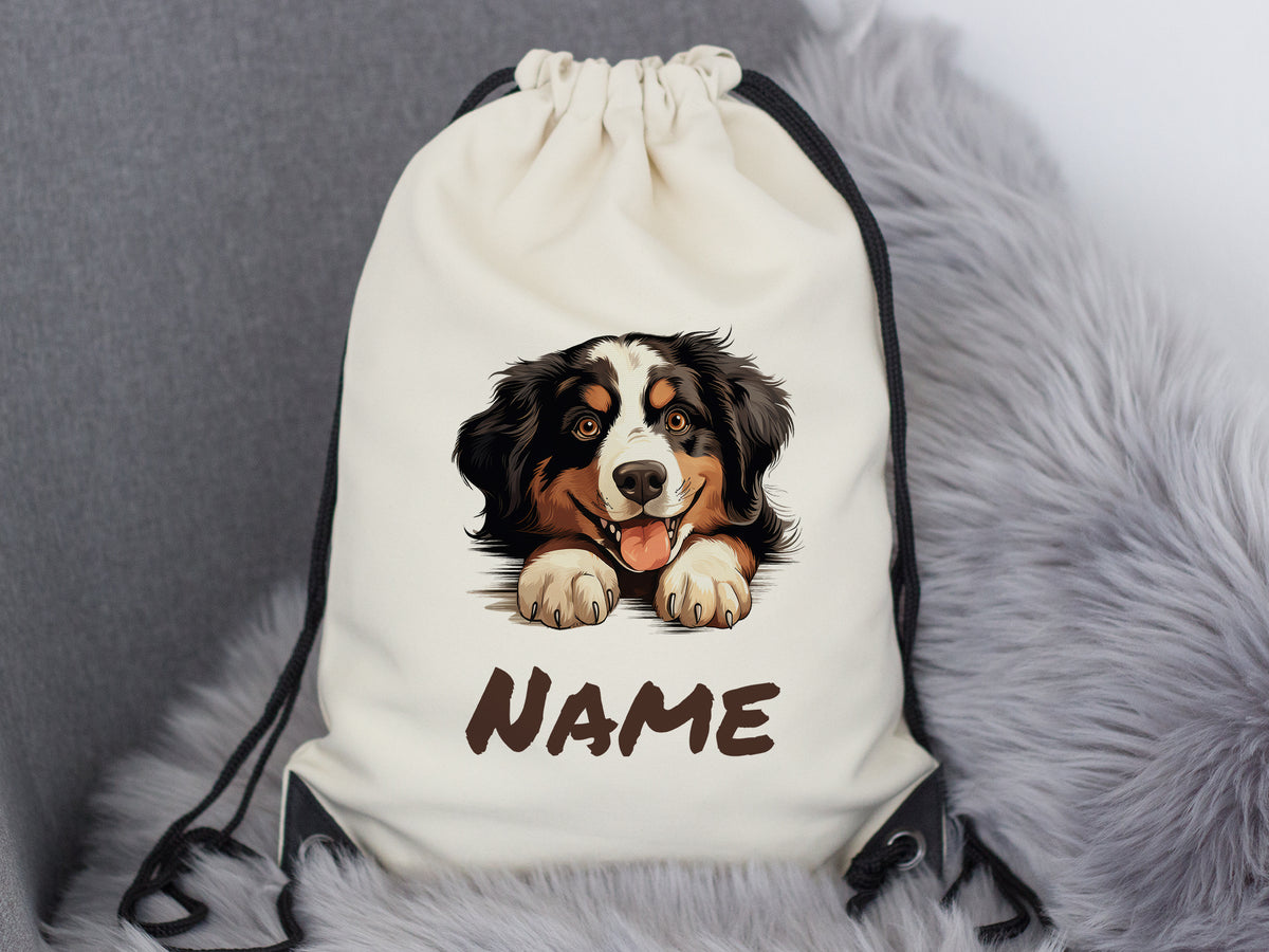Beige Turnbeutel mit Hundemotiv und personalisierbarem Namen.